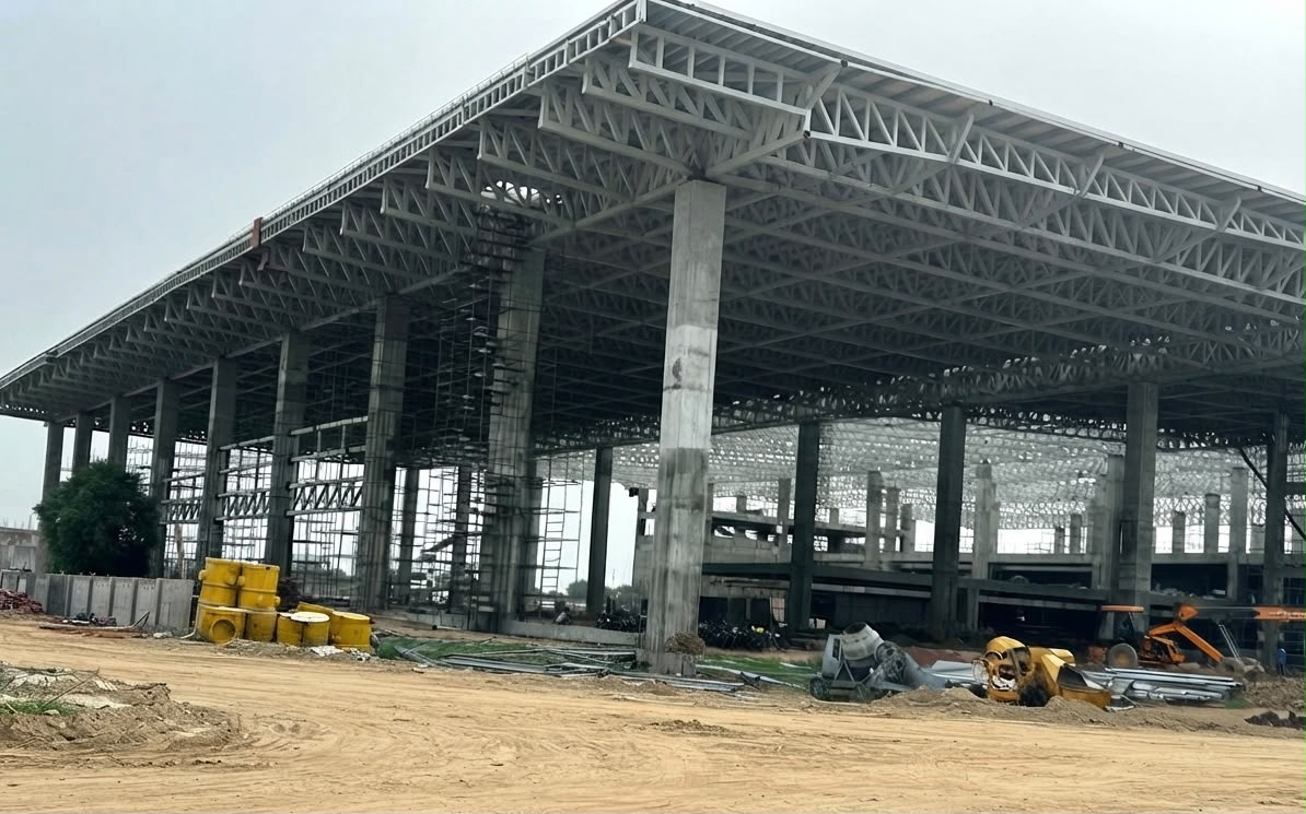 Agra Airport new terminal 2026 - front view of concrete pillars and steel roof
